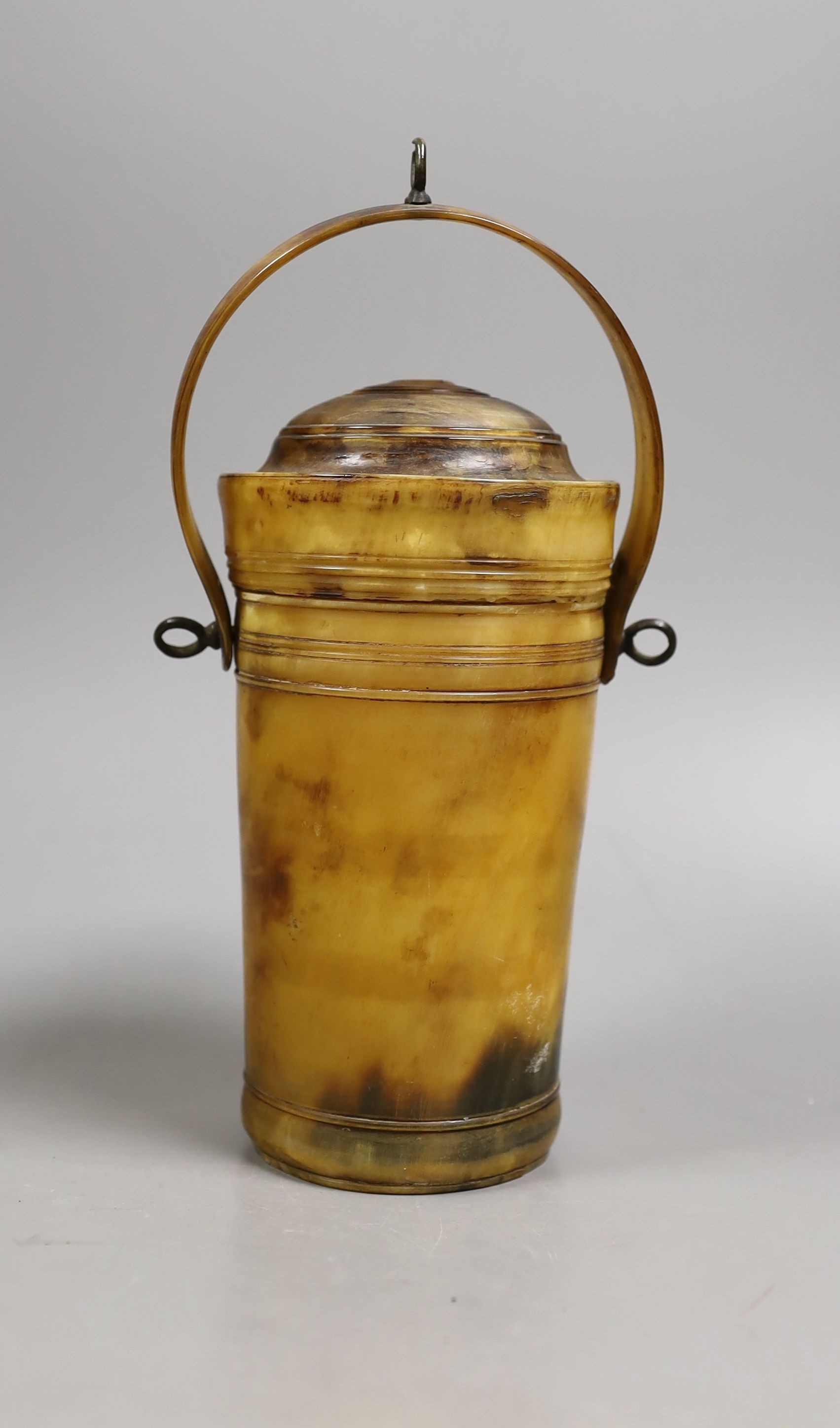 A 19th century horn portable beaker, 23 cms high including handle.